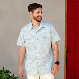 Man standing outside during spring.