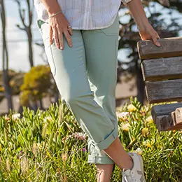 Woman standing outside during spring time.